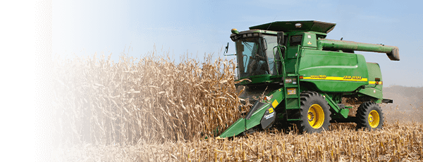 John Deere Combine with Corn Header